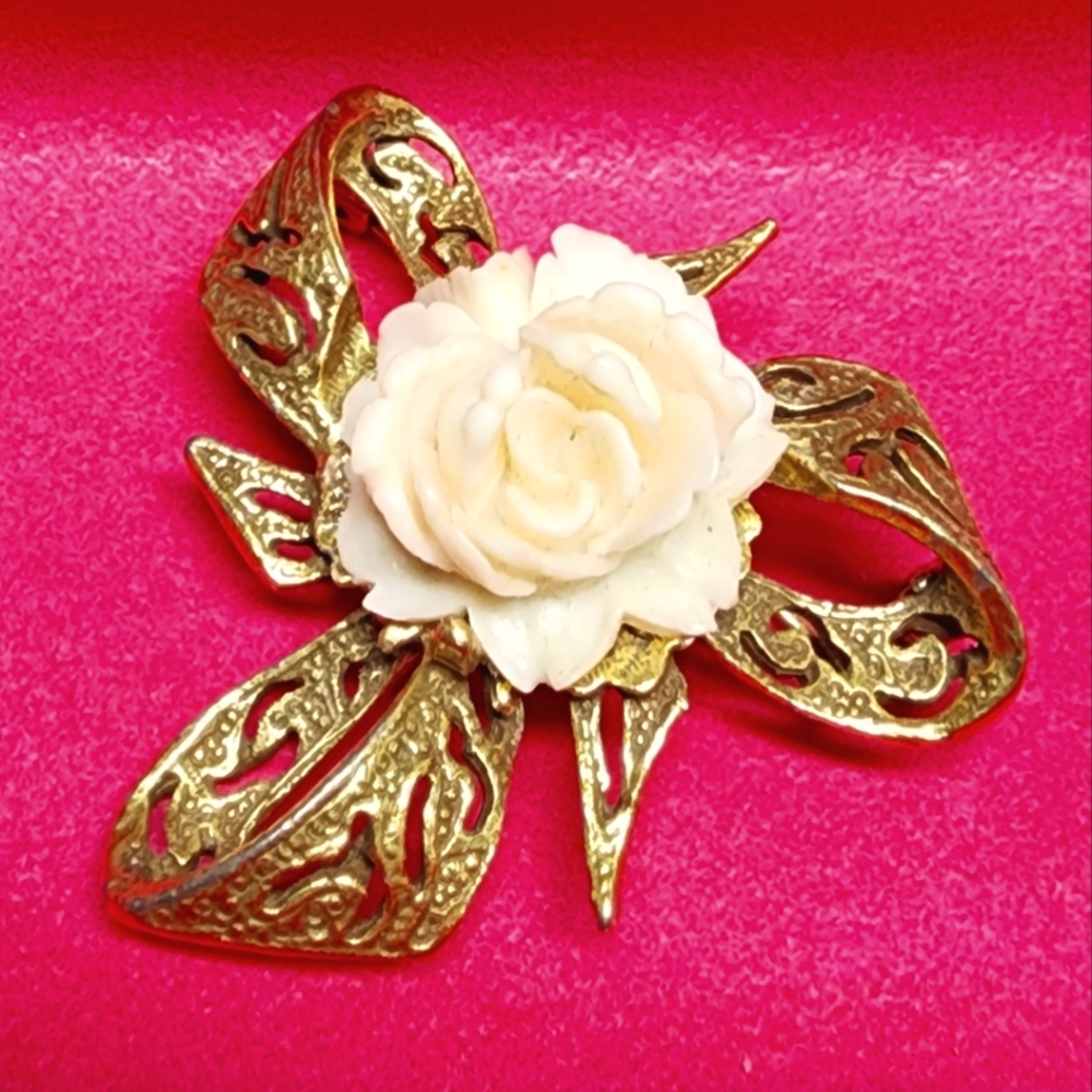 Vintage Pin over 80 Years Old Rose is ivory.